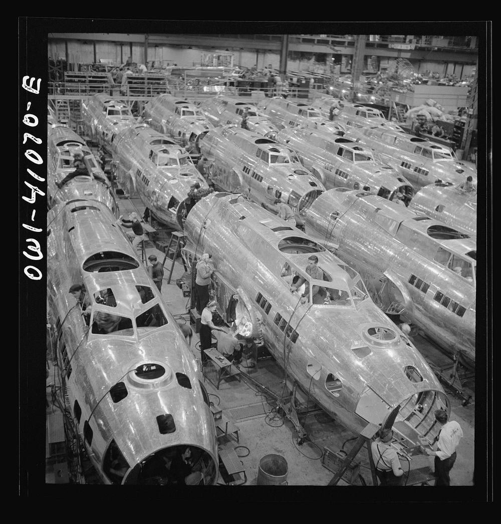 Boeing aircraft plane, Seattle, Washington. Production of B-17F (Flying Fortress) bombing planes. Fuselage section. Sourced…