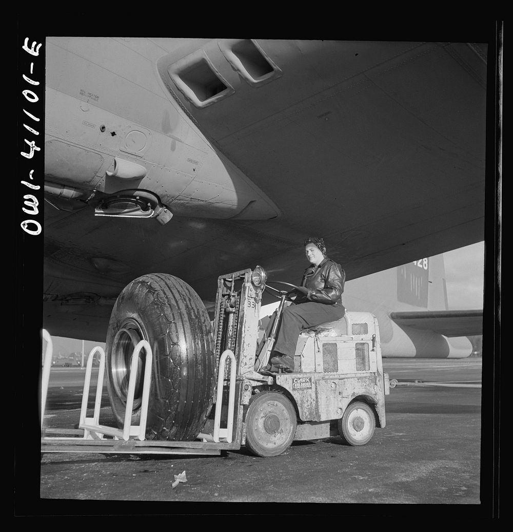 [Untitled photo, possibly related to: Production. B-17 heavy bomber. A landing wheel, with its huge rubber "shoe," is…