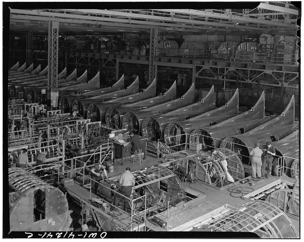 [Untitled photo, possibly related to: Boeing aircraft plant, Seattle, Washington. Production of B-17F (Flying Fortress)…