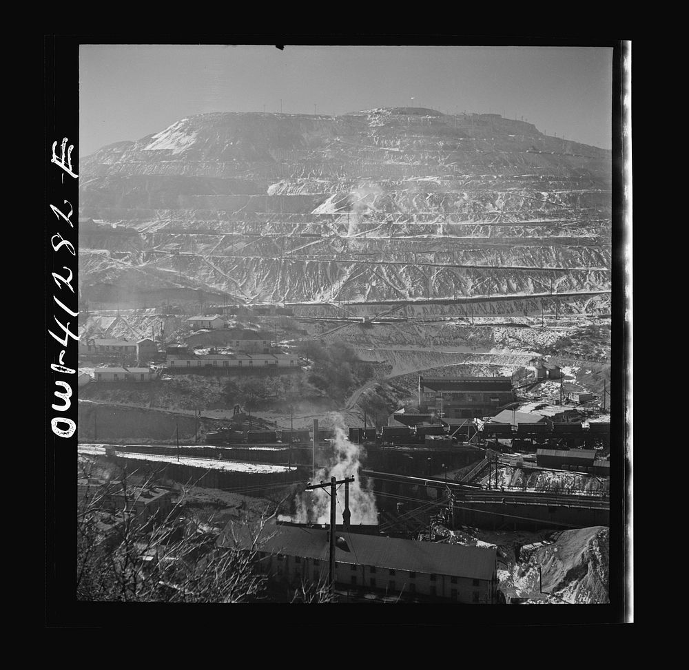 [Untitled photo, possibly related to: Bingham Canyon, Utah. Open-pit workings of the Utah Copper Company, showing loaded ore…