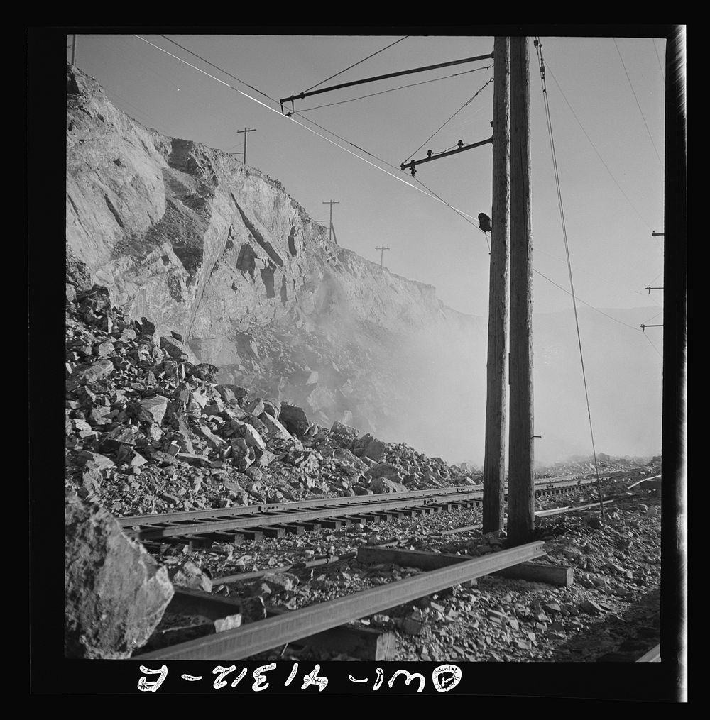[Untitled photo, possibly related to: Bingham Canyon, Utah. Blasting at an open-pit mine of the Utah Copper Company].…