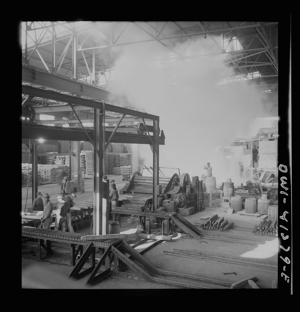 [Untitled photo, possibly related to: Phelps Dodge refining company, El Paso Texas. Interior of the plant showing stacks of…