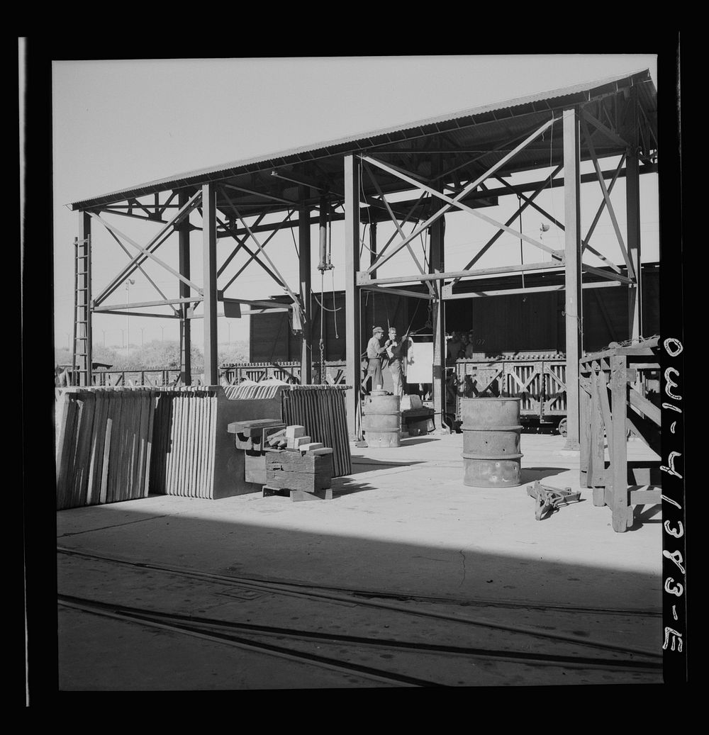 Phelps Dodge refining company, El Paso, Texas. Smeltered copper being put on conveyors. Sourced from the Library of Congress.