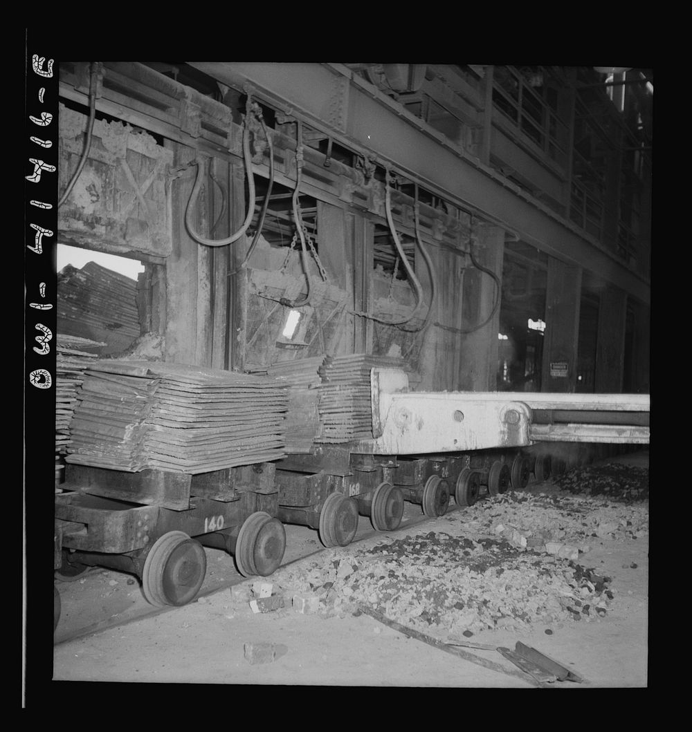 [Untitled photo, possibly related to: Phelps Dodge refining company, El Paso, Texas. Charging sheets of copper, produced by…
