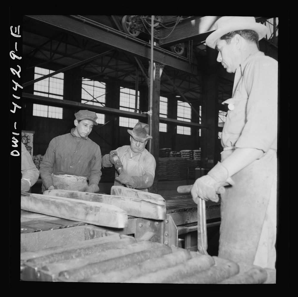 [Untitled photo, possibly related to: El Paso, Texas. Workman trimming an ingot at the Phelps Dodge refining plant]. Sourced…