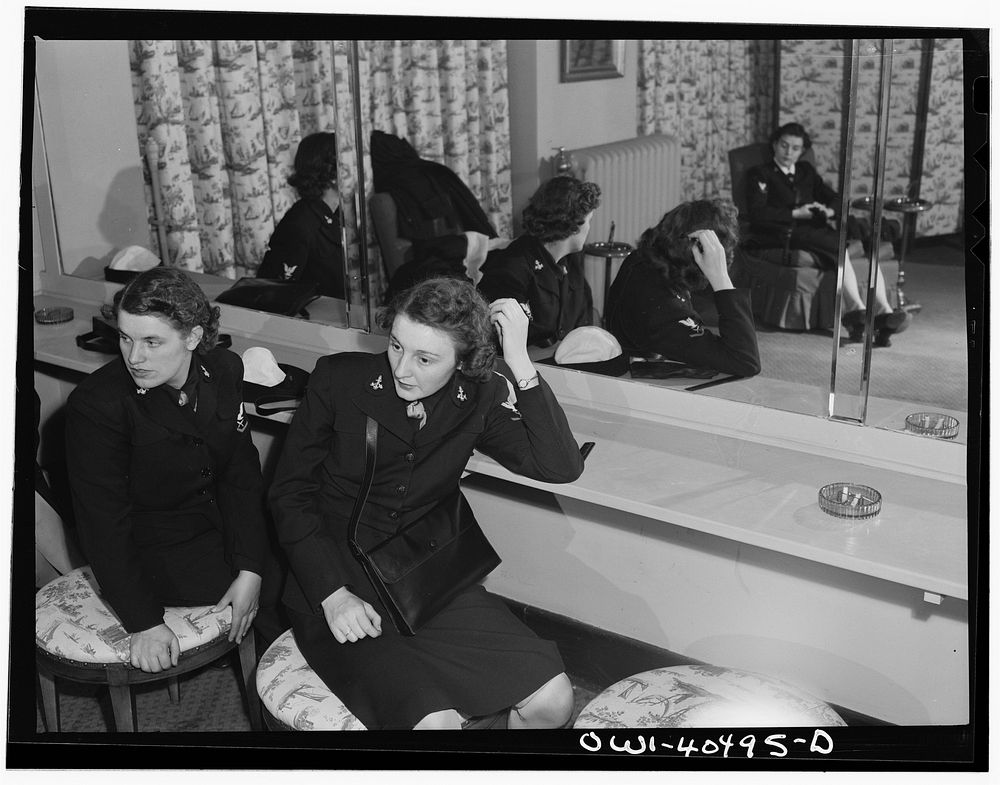 Washington, D.C. A group of WAVES (Women Accepted for Volunteer Emergency Service), just off a train, freshen up in the…