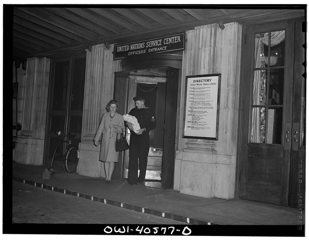 Washington, D.C. Hugh and Lynn Massman leaving the United Nations service center with their baby. Sourced from the Library…