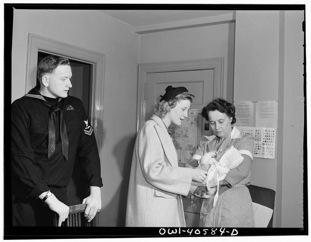 Washington, D.C. Lynn Massman giving instructions to the volunteer worker at the nursery in the United Nations service…