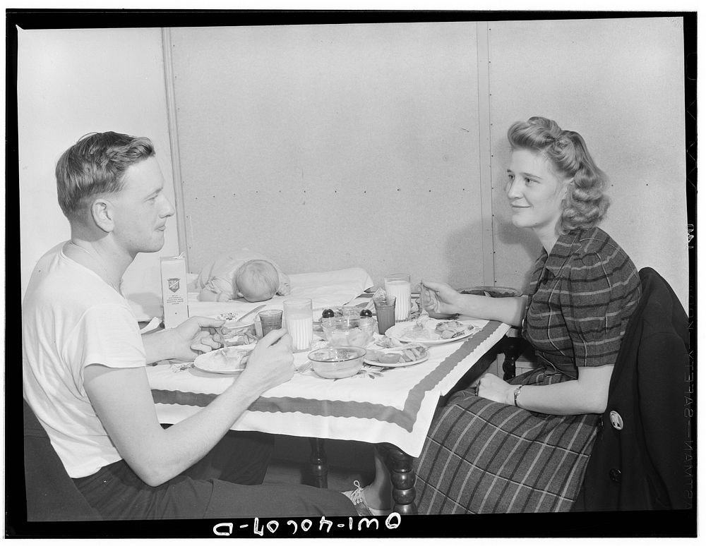 Washington, D.C. Hugh Massman, a second class petty officer who is studying in Washington, and his wife eating dinner. Joey…