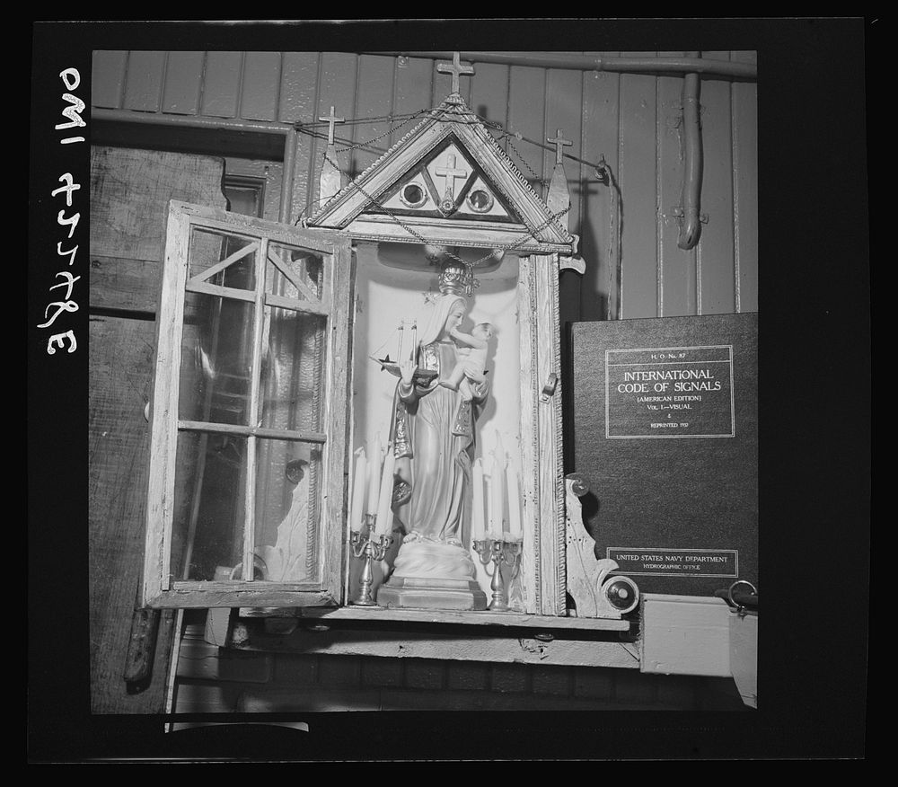 Gloucester, Massachusetts. The "Mother of Good Voyages" statue in Captain John Riberia's [i.e., Ribeiro's] quarters on the…