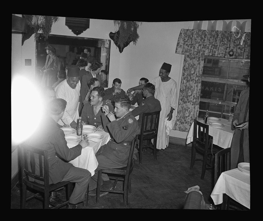 Cairo, Egypt. Dining room at the United States Army Red Cross club. American enlisted men on leave can get piping hot…