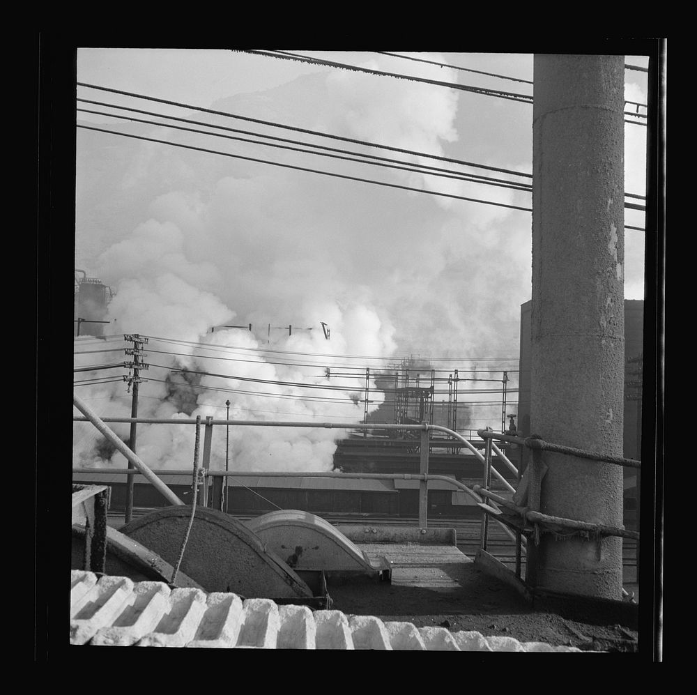[Untitled photo, possibly related to: Columbia Steel Company at Ironton, Utah. Looking upon coke ovens. The steam indicates…