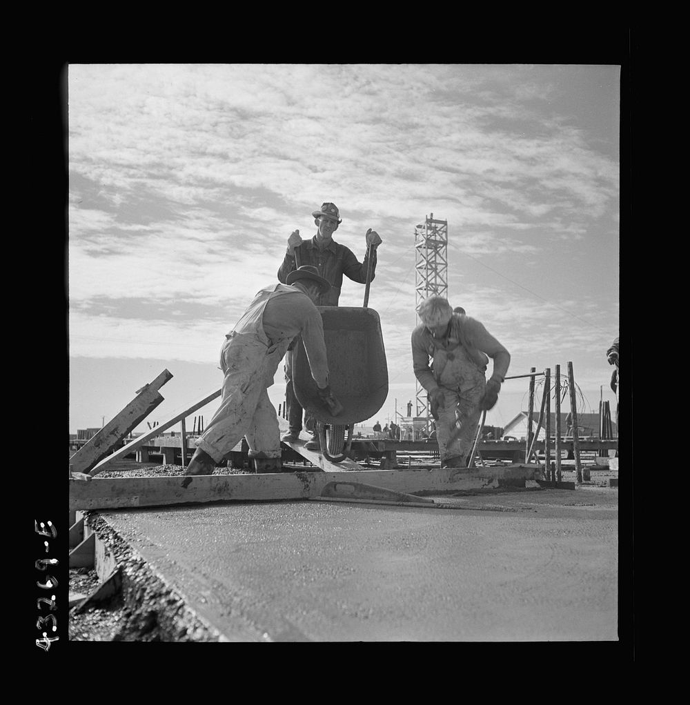 [Untitled photo, possibly related to: Columbia Steel Company at Geneva, Utah. Steel and concrete go into place rapidly as a…