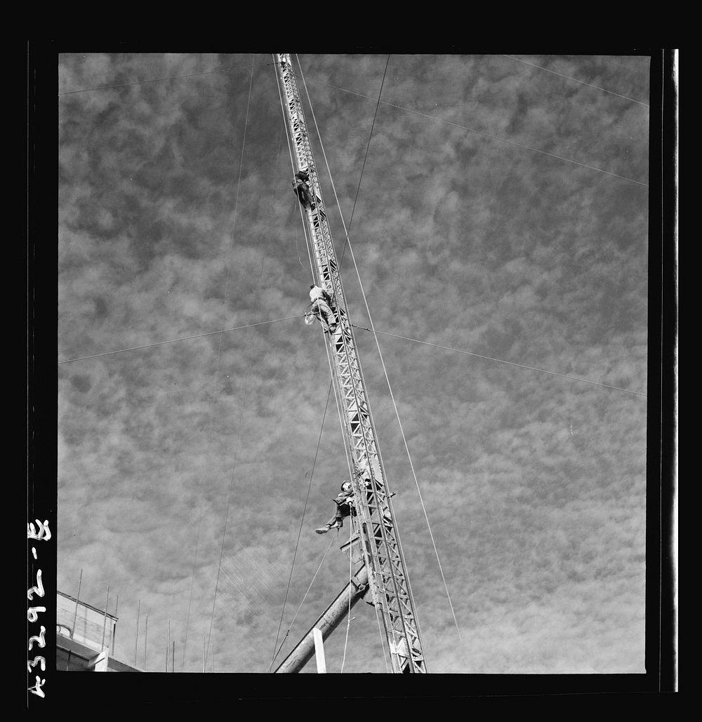 [Untitled photo, possibly related to: Columbia Steel Company at Geneva, Utah. Surveyor running lines for a water intake…