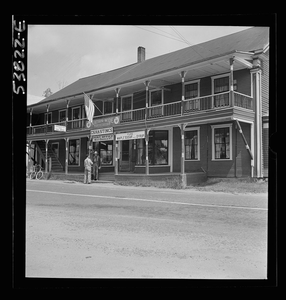 West Danville, Vermont. The two-story porch-framed general store belonging to G. S. Hastings showing the post office sign…