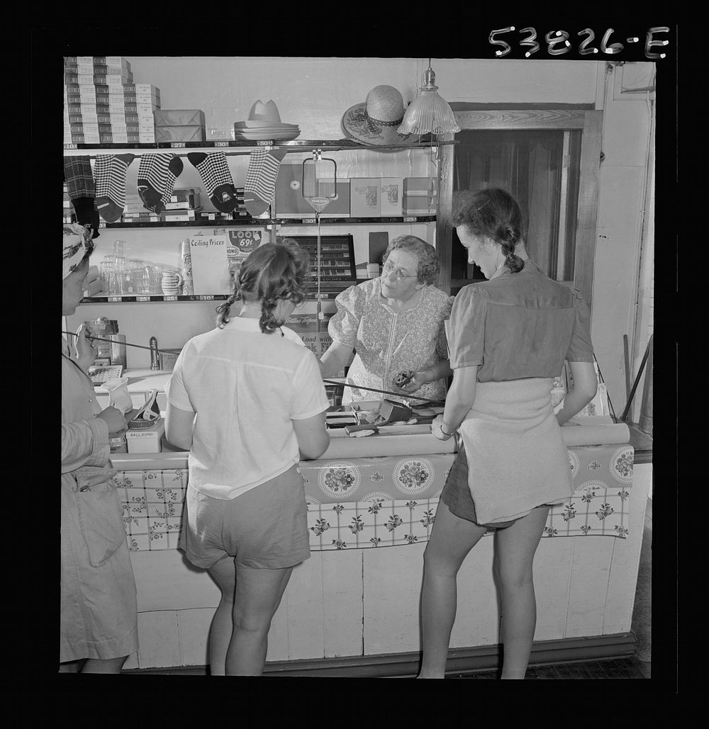 West Danville, Vermont. Girls from Saint Johnsbury where they are spending a weekend on Joe's Pond, looking over fishing…