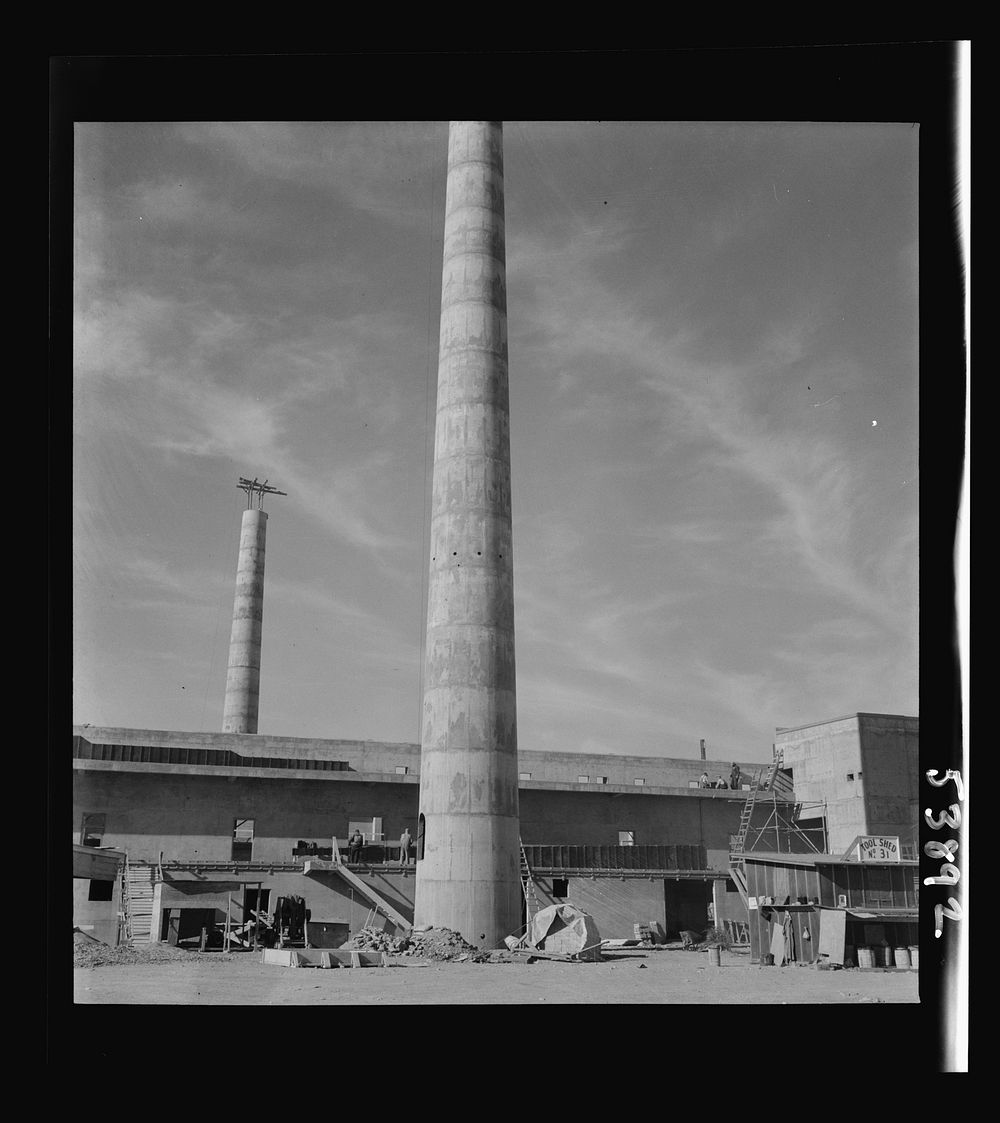 Las Vegas, Nevada. A view of the plant of Basic Magnesium Incorporated, showing a tool shed and part of two buildings on…
