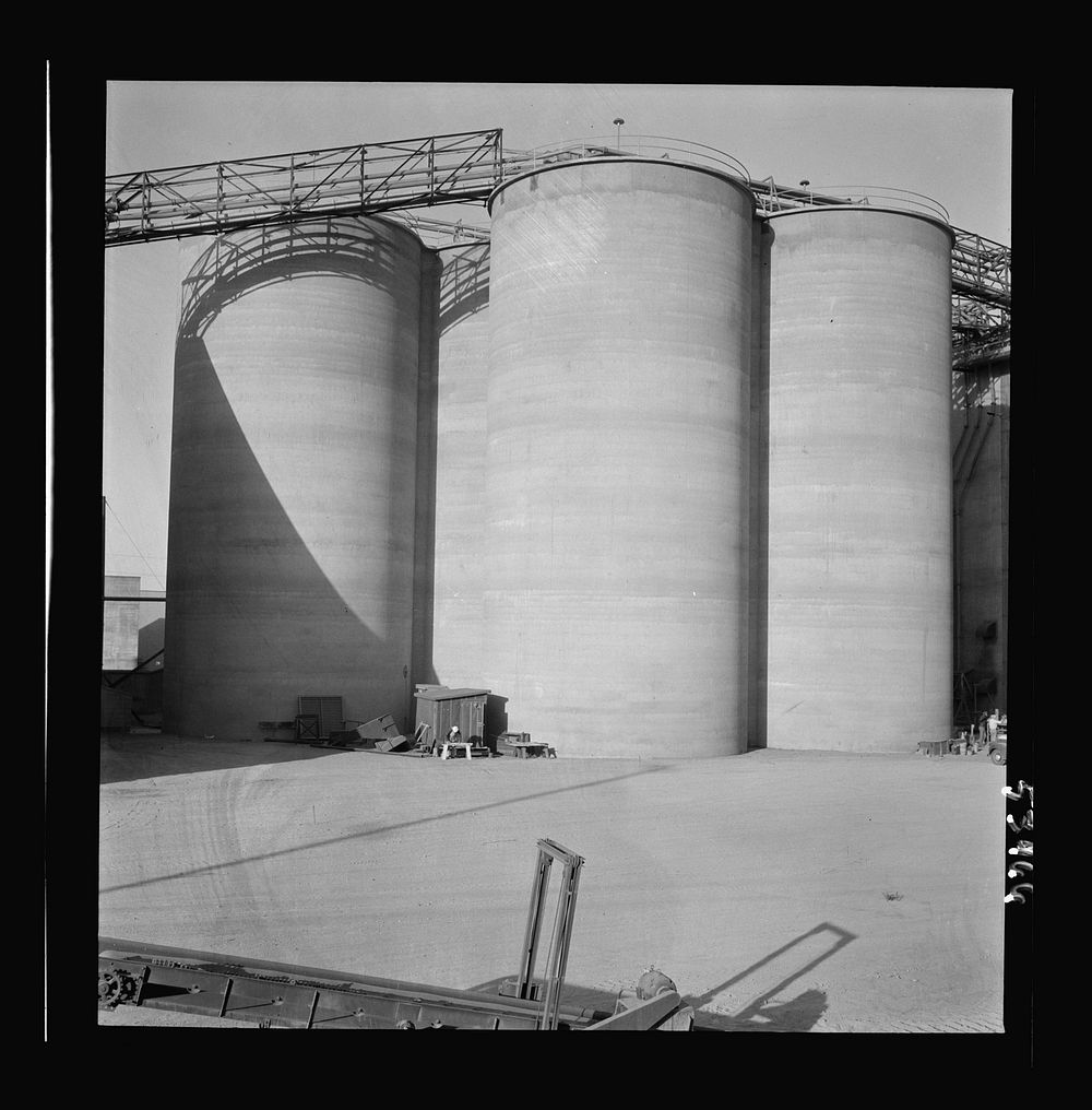 [Untitled photo, possibly related to: Las Vegas, Nevada. Giant silos, eighty-four feet high, for the storage of ore for the…