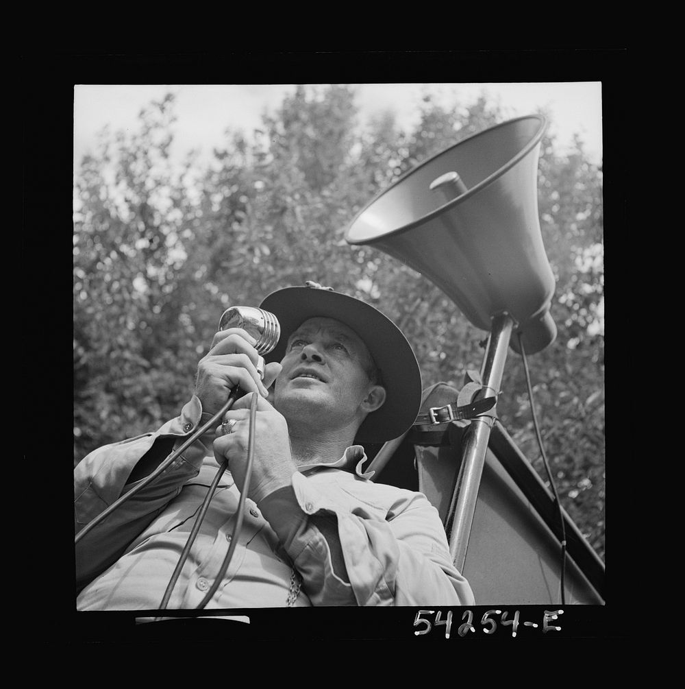 [Untitled photo, possibly related to: Fort Belvoir, Virginia. A sergeant issuing orders over a loud speaker]. Sourced from…