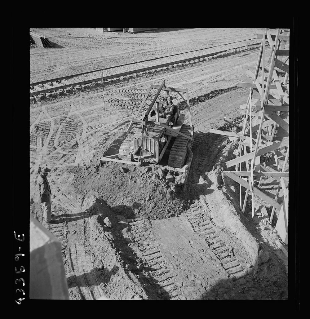 Columbia Steel Company at Geneva, Utah. Bulldozer used in grading during the construction of a new steel mill which will…