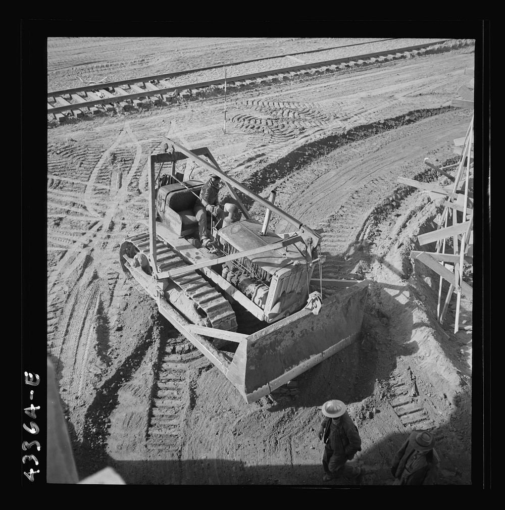 Columbia Steel Company at Geneva, Utah. Bulldozer used in grading during the construction of a new steel mill which will…