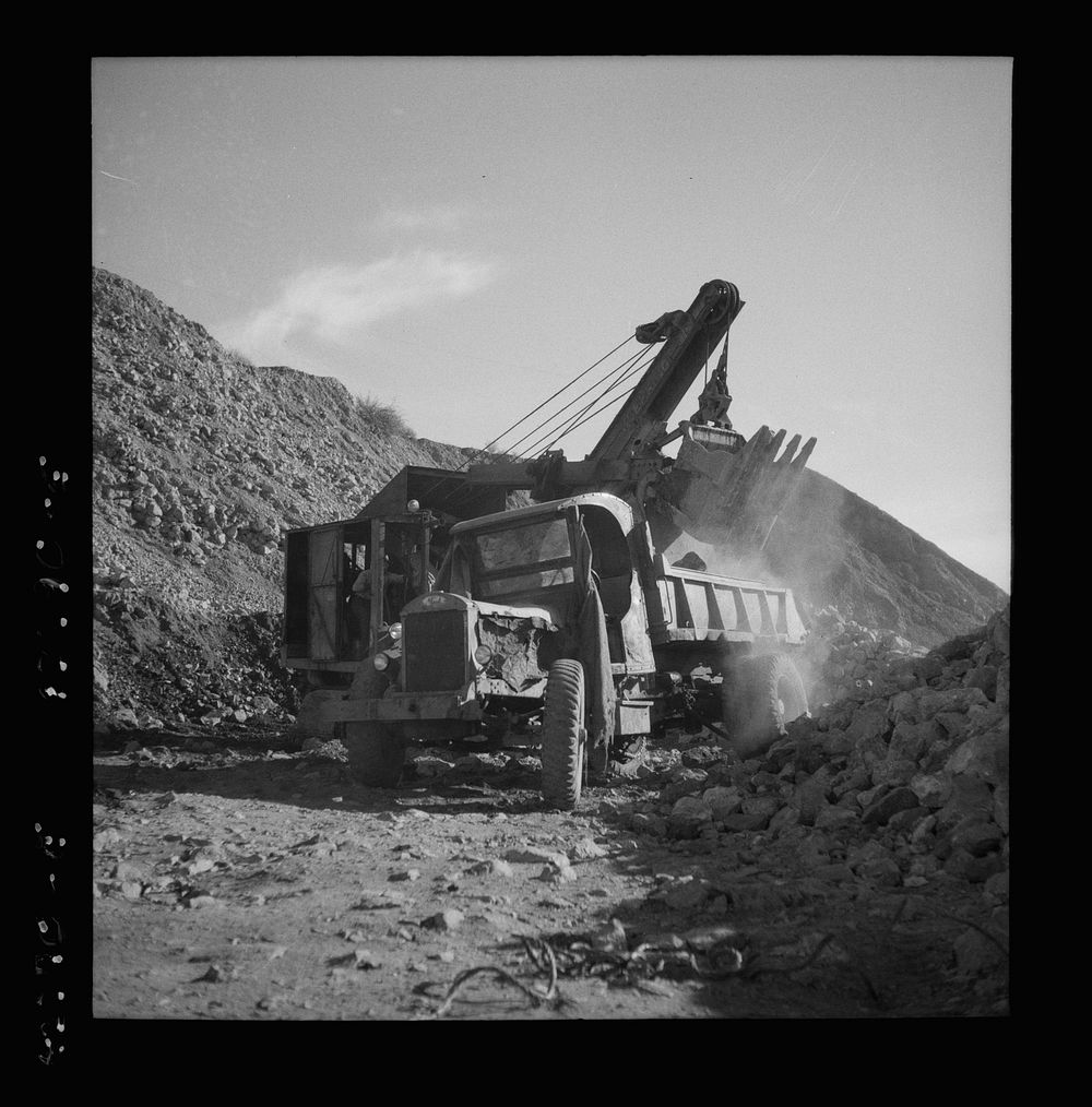 New Idria, California. A power shovel loading mercury ore, called cinnabar, at an open-cut mine of the New Idria Quicksilver…