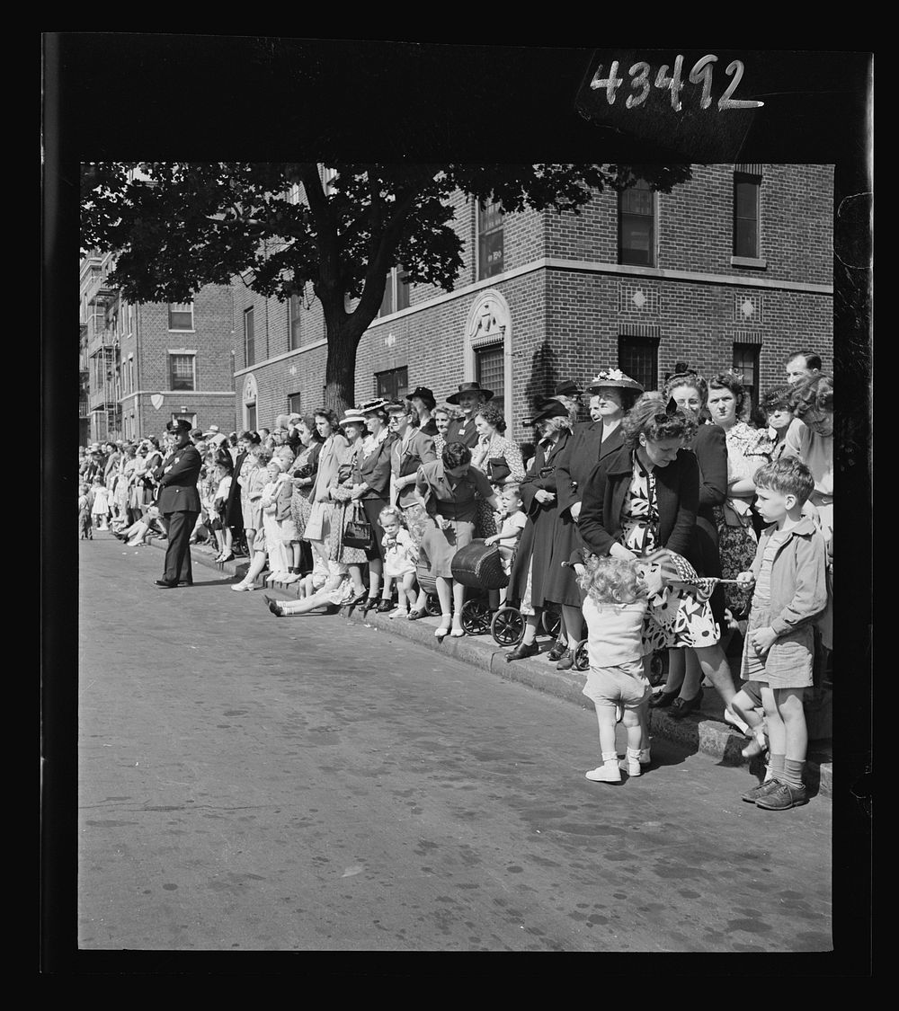 Brooklyn, New York. Crowds watching the Anniversary Day parade of the Sunday school of the Church of the Good Shepherd.…