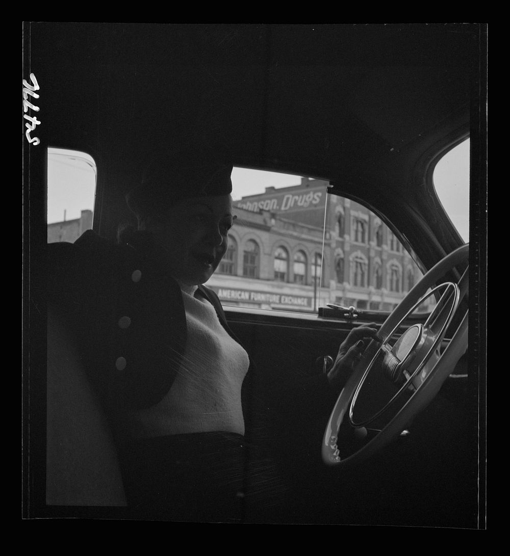 [Untitled photo, possibly related to: Portrait of a woman training to operate buses and taxicabs]. Sourced from the Library…