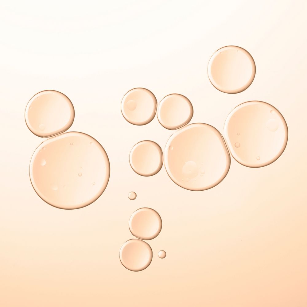 Abstract oil bubble macro shot orange transparent liquid