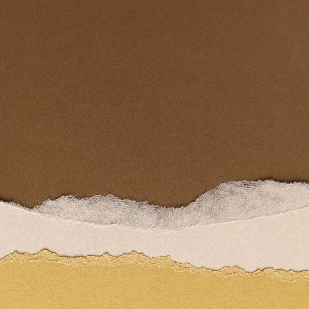 Torn brown paper border on handmade earth tone background