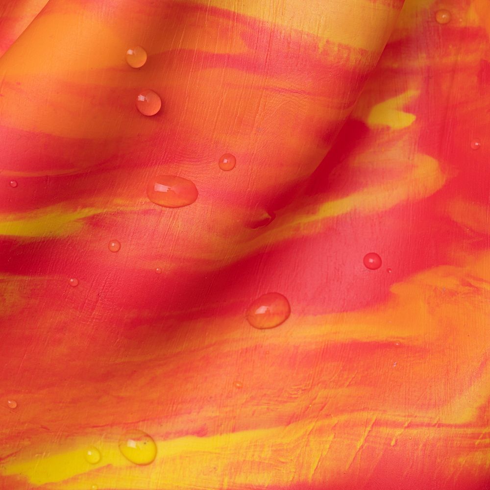 Tie dye clay background in orange handmade creative art abstract style