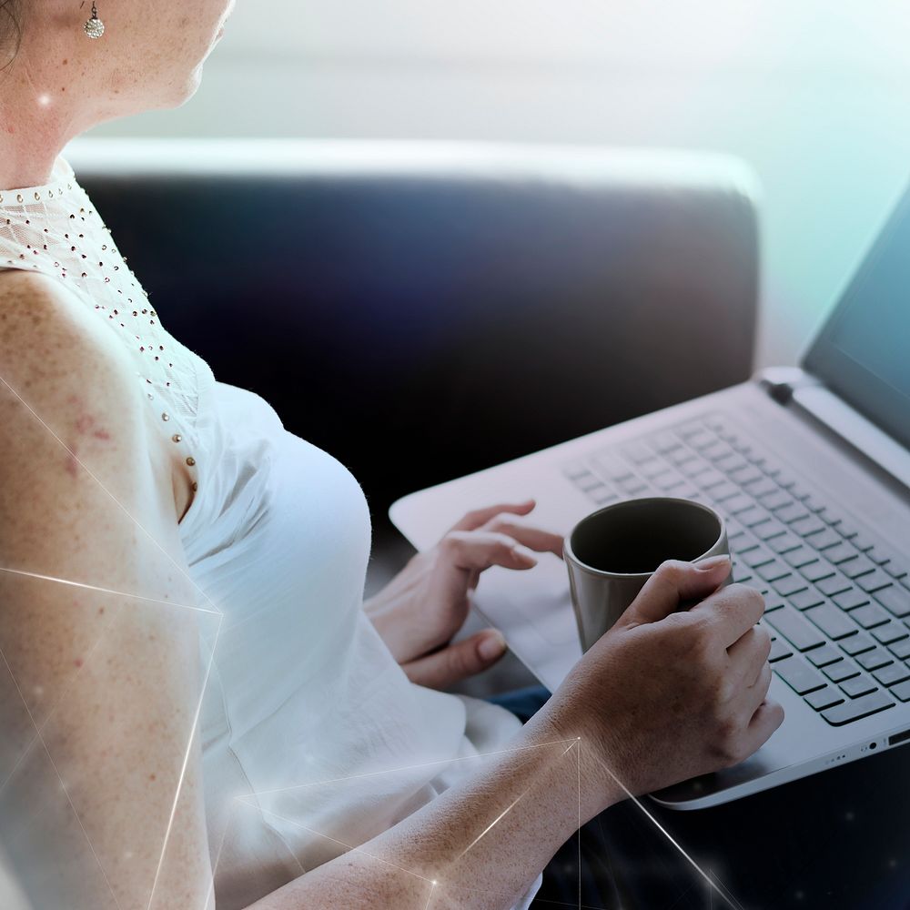 Woman using a laptop global network technology digital remix