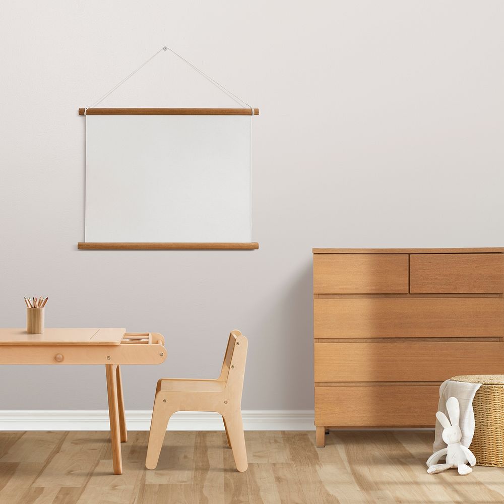 Blank frame hanging in minimal kids room interior design