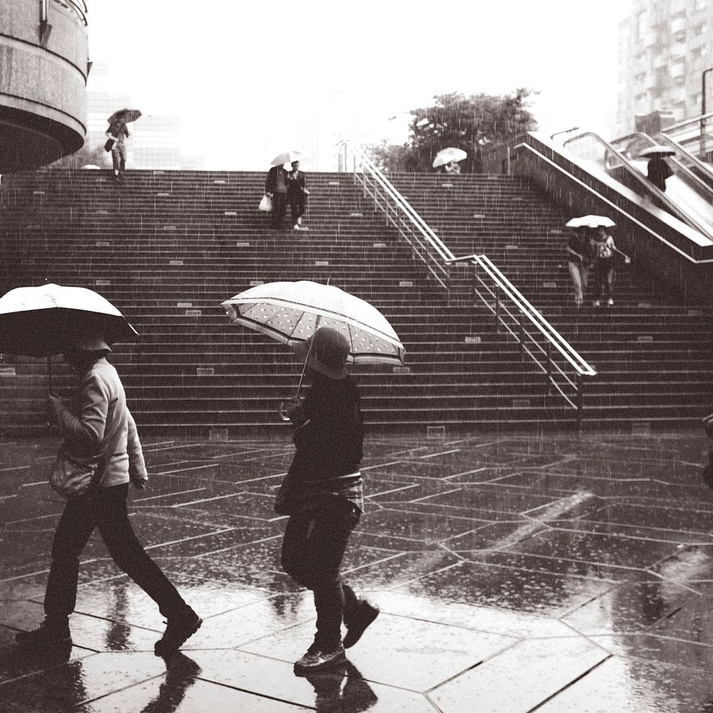 Monochrome rainy day background, people photo