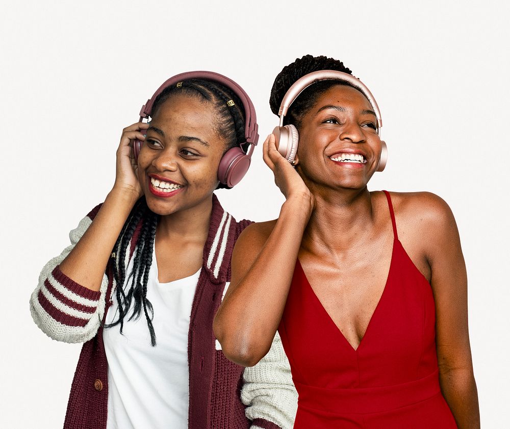 Happy diverse women listening to music, isolated on off white