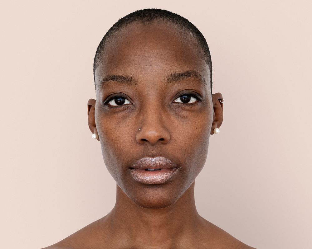 African woman face photography, skinhead hairstyle