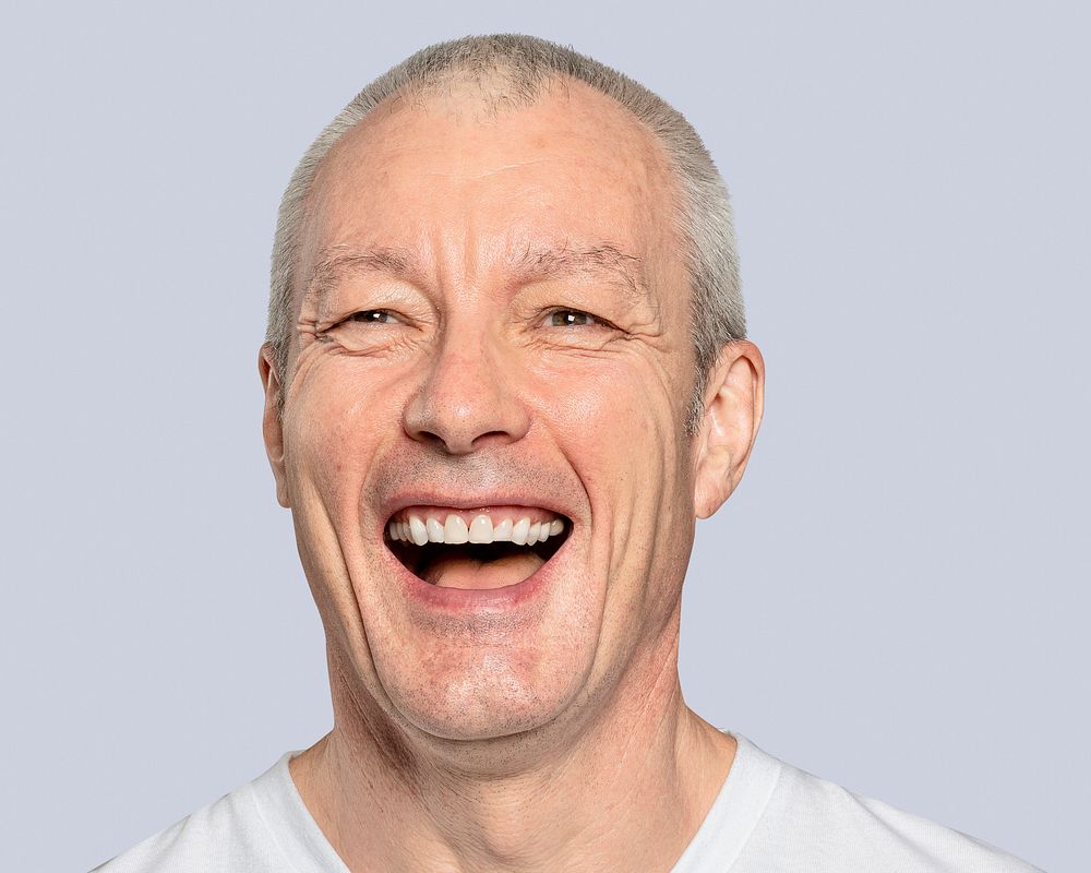 Cheerful senior man, smiling face portrait