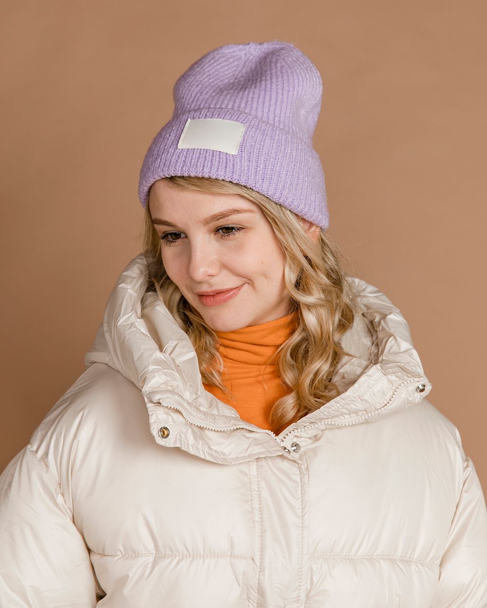 Blonde woman wearing a winter outfit