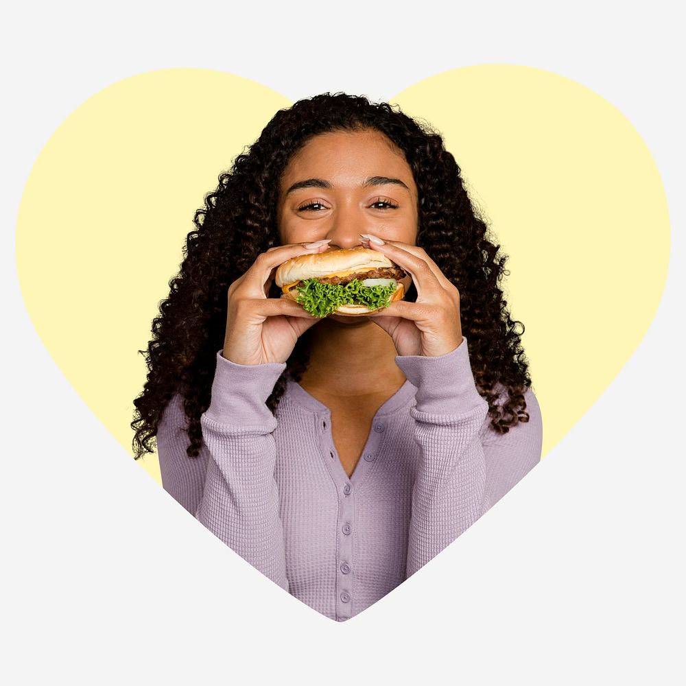 Woman eating hamburger, yellow heart shape badge