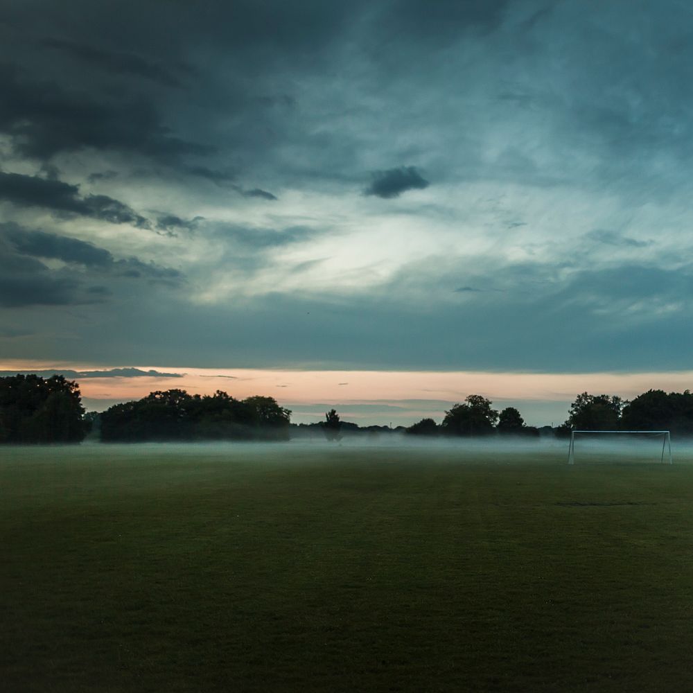 Mist over a rural soccer field. Original public domain image from Wikimedia Commons