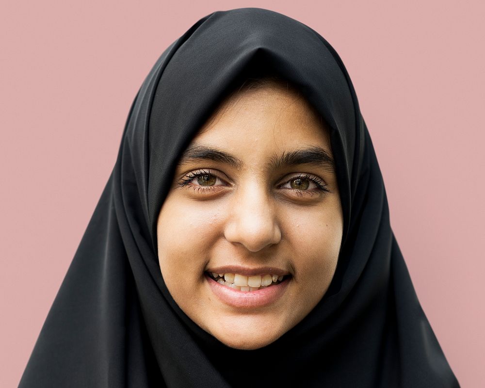 Muslim woman portrait in hijab, smiling face close up