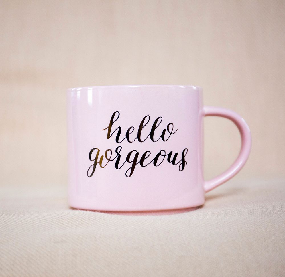 Free hello gorgeous pink coffee mug public domain CC0 photo.