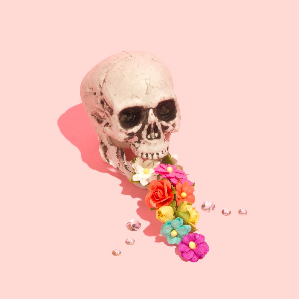 Skull vomiting colorful flowers