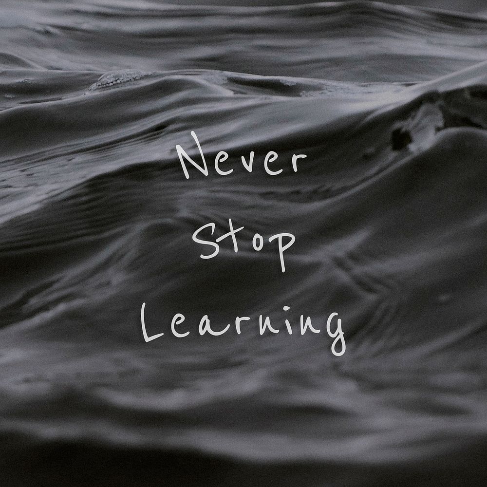 Never stop learning quote on a water wave background