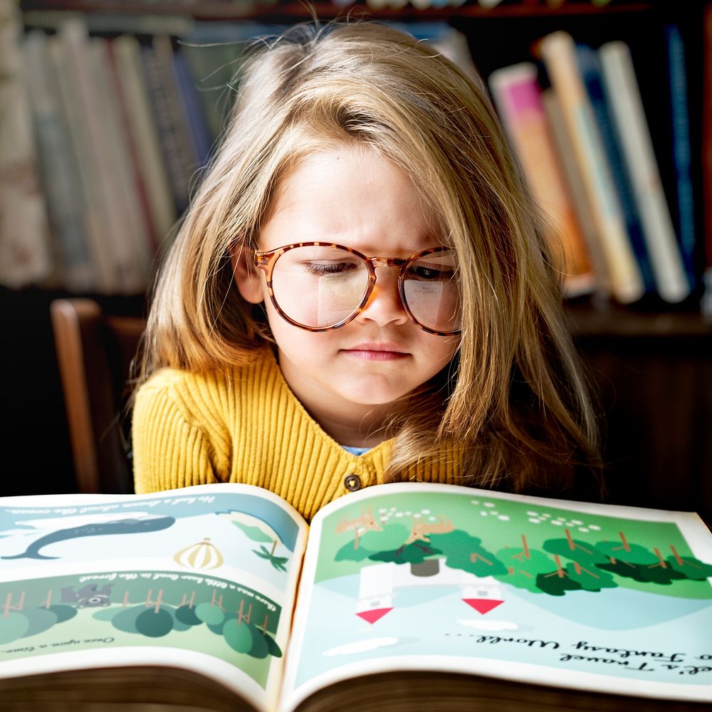 Little girl reading a story