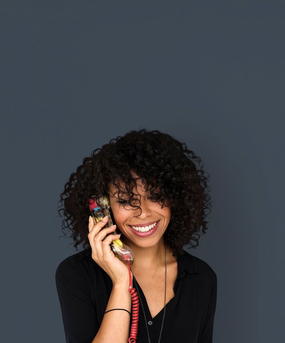 African descent woman talking by phone