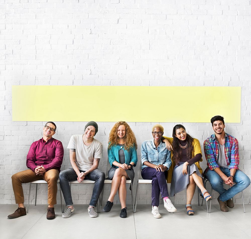 Diverse People Sitting Cheerful Wall Concept