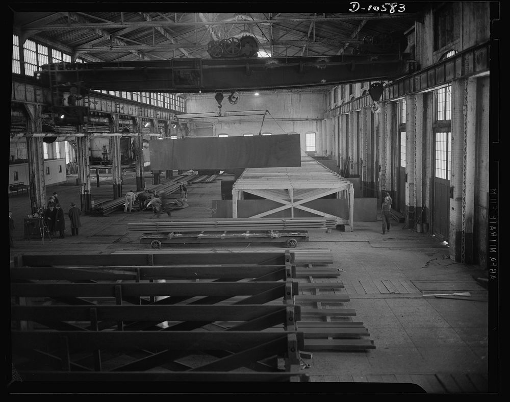 Denver, Colorado. Interior of a once-abandoned railroad machine shop, now producing fabricated steel parts for the hulls of…