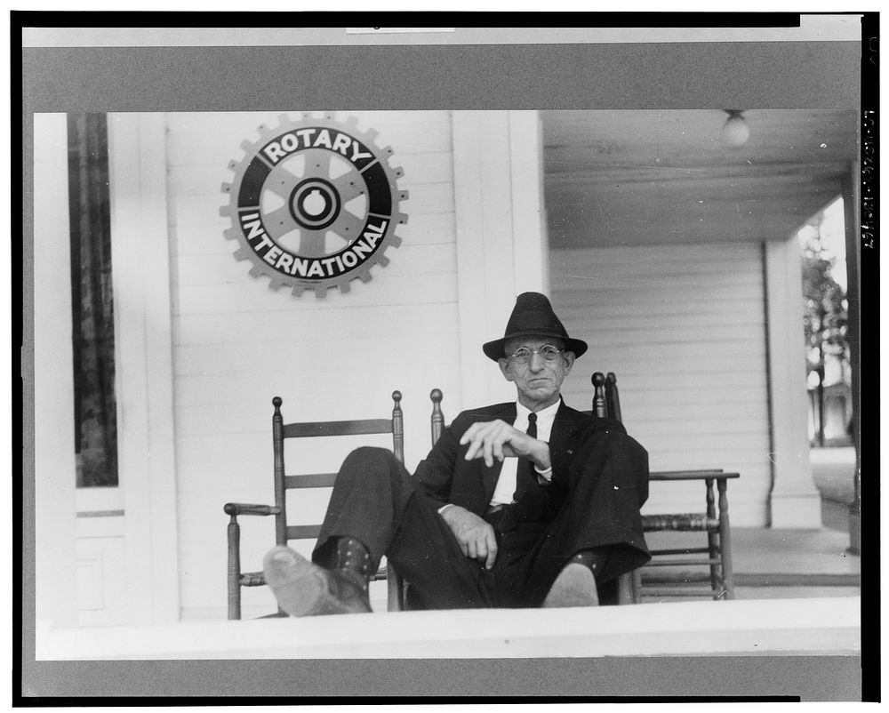 Porch sitter, hotel, Vergennes, Vermont. Sourced from the Library of Congress.