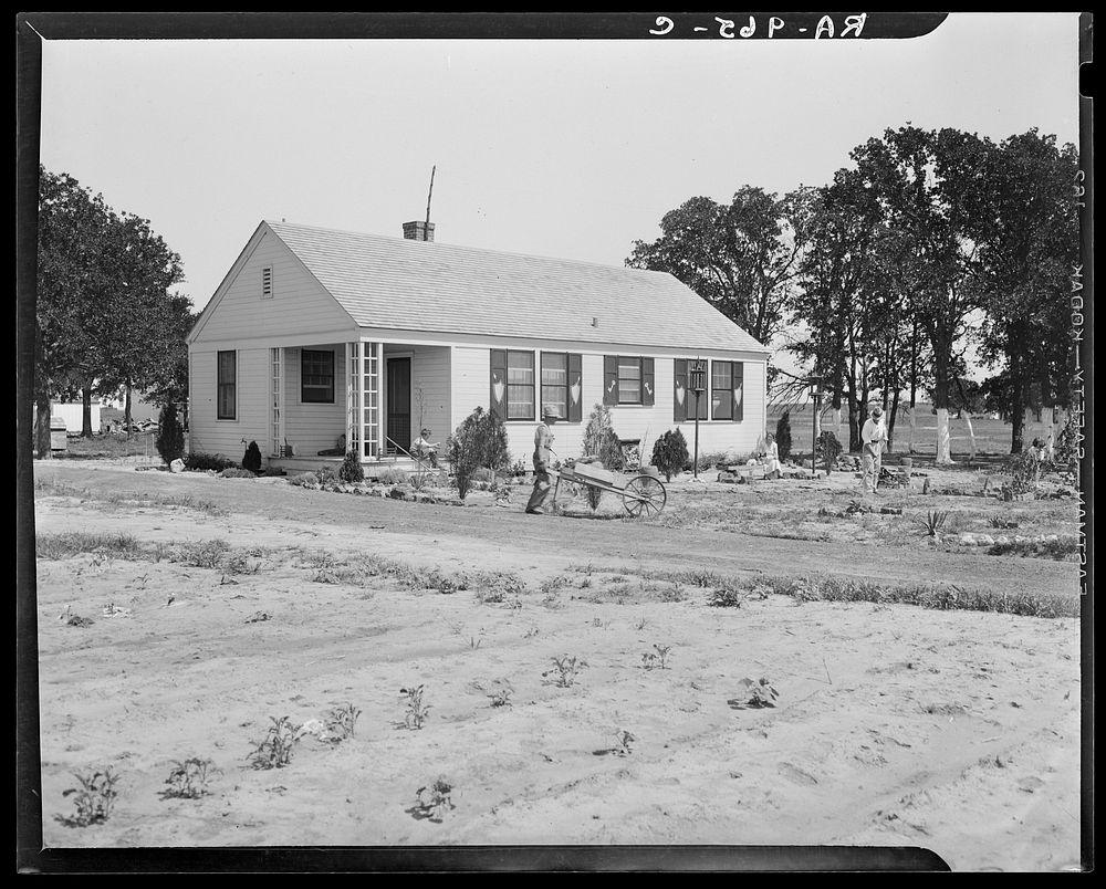 Homesteaders at work in front of their new house. Dallas, Texas. Sourced from the Library of Congress.